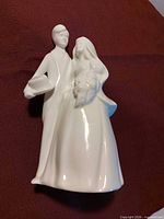 Front view of Royal Doulton bride and groom figurine