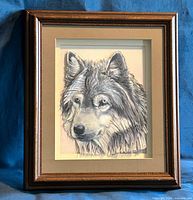 Full view of framed wolf layered paper artwork