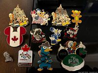 Overhead view of the full set of 13 collectible pins