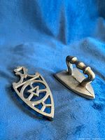 Trivet and miniature sad iron top view