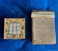 Front view of compact and cigarette case side by side