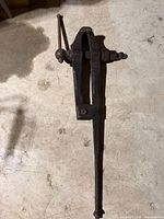 Full view of cast iron leg vise showing long leg and handle