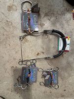 Overview of four new bits with tags on concrete floor