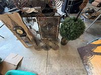 Top view showing London clock sign, spiral panels, topiary