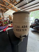 Front view showing SALADA ICED TEA lettering, barrel shape, spigot
