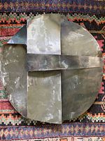 Front view showing full circular sculpture and design