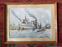 Frontal view of framed watercolour harbour scene
