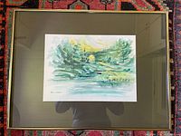Full view of framed painting with mat and frame