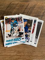 Front view of several Upper Deck Young Guns cards, top card Jeff Odgers
