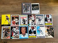 All 14 Wayne Gretzky hockey cards laid out on table