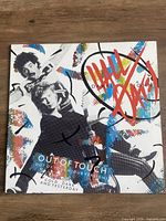Front of picture sleeve showing artwork and song titles