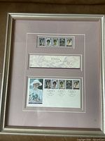 Front view of framed Diana Princess of Wales stamp collection
