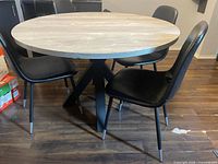 Table and four chairs overall view