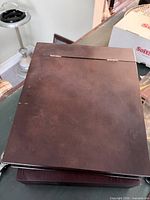 Closed top view of dark mahogany wooden box