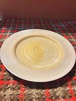 Top view showing spiral pattern and cream-to-yellow glaze