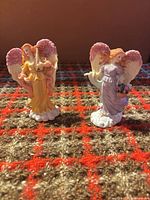 Both Seraphim Classics angel figurines side by side