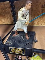 Full view of Obi-Wan Kenobi figure on Star Wars base