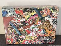 Front of sealed puzzle box showing artwork and piece count