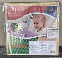 Front of sealed Lekebaby baseplate pack showing brand and illustration