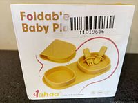 Front of box showing Yahaa foldable baby plate and cutlery set image