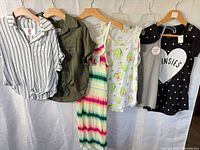 All six clothing items hung for overview