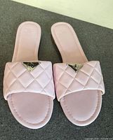 Top view of both sandals showing quilted straps and JF footbed logo