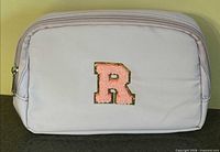 front view showing fanny pack and R patch