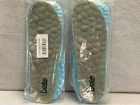 Front view of two sealed pairs showing grey tops with Posh logo