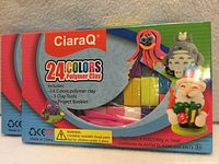 Front view of two CiaraQ 24 Colors Polymer Clay kits showing contents list and branding