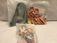 All three sealed collars in clear bags