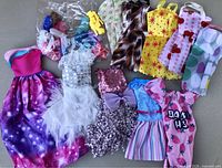 All dresses and shoe bag laid out