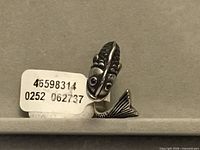front view showing koi fish head and body on ring