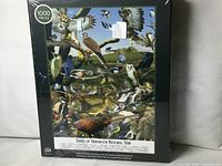 Front of sealed puzzle box showing artwork and piece count