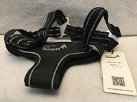 Overall view of black reflective dog harness size L
