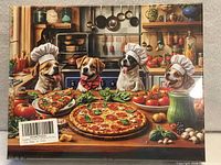 Front of sealed puzzle box showing dog-pizza artwork