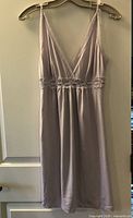 Front view of lavender nightie on hanger