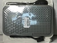 Front view of packaged two grey silicone licking mats, black spatula visible