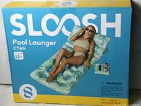 Front of box showing Sloosh Pool Lounger image and specs