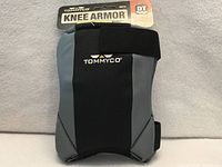 Front view of packaged TommyCo Knee Armor kneepads