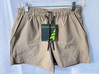 Front view showing drawstring waist, tag, color, and logo