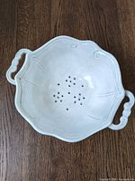 Top view showing interior, handles, drainage holes