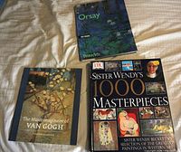Front covers of the three art books