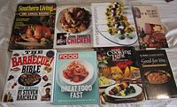 All eight cookbooks laid out cover-up for title visibility