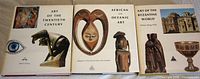 Front covers of the three Abrams art books standing side-by-side