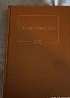 Front cover showing brown cloth and gilt-stamped title