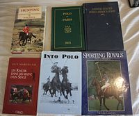 Front covers of six hardcover books on polo and hunting