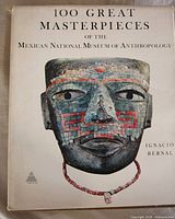 Front dust jacket showing title and mosaic mask image