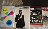 Front view of four titles showing covers and formats