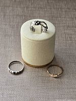 Group shot of all three rings showing overall styles and metals