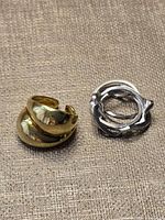 Both rings side by side showing designs and finishes